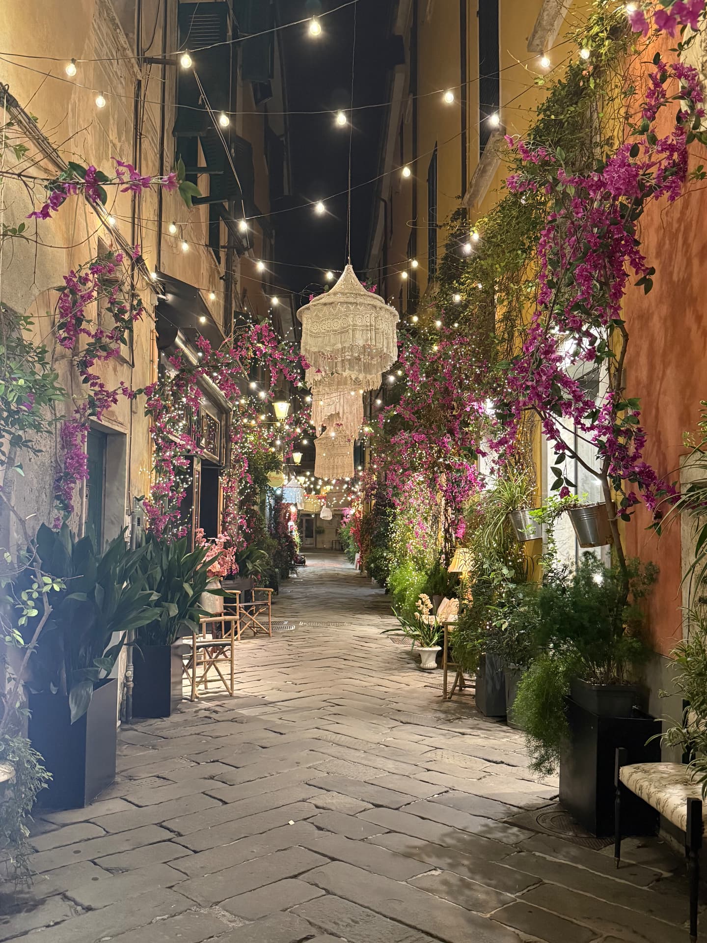 A lantern-lit alley in Sarzana at night